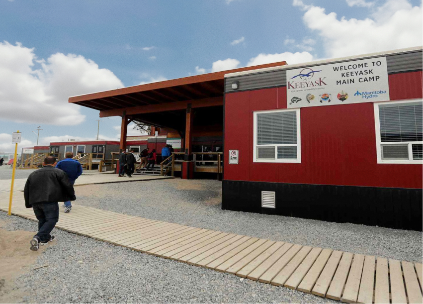 People walk towards camp lobby at Sodexo Keeyask project