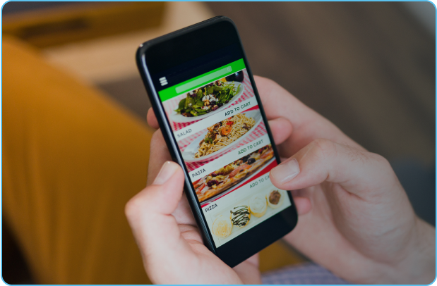 Person orders food on mobile application displaying multiple menu items.