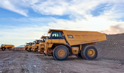 Haul trucks at open pit mine