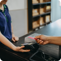 Store clerk accepts credit card payment